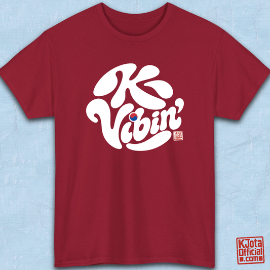 “K-Vibin’” printed on front of red t-shirt flatlay South Korea fandom merch by K-Jota