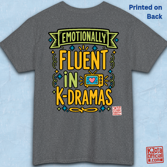“Emotionally Fluent in K-Dramas” printed on front of tee, Korean show superfan identity binge watching t-shirt gray backside flatlay by K-Jota