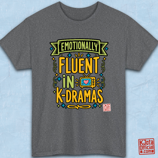 “Emotionally Fluent in K-Dramas” printed on front of tee, Korean show superfan identity binge watching t-shirt gray flatlay by K-Jota