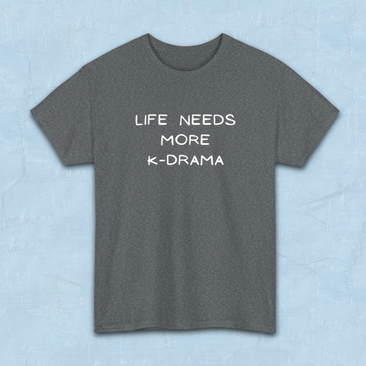 Gray t-shirt for Korean show fans with 'LIFE NEEDS MORE K-DRAMA' text on a light blue background by Kjota