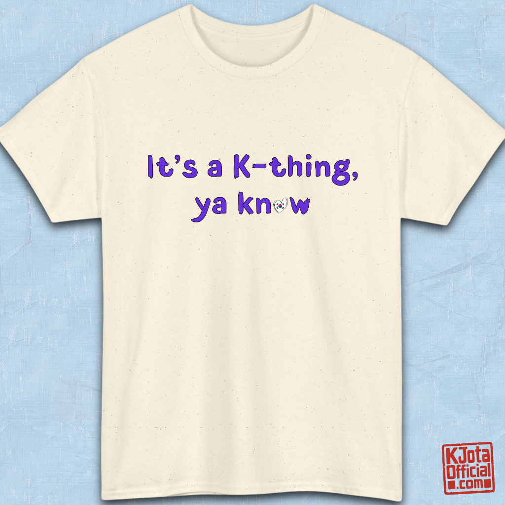 “It’s a K-thing, Ya Know” printed on beige t-shirt flatlay by K-Jota