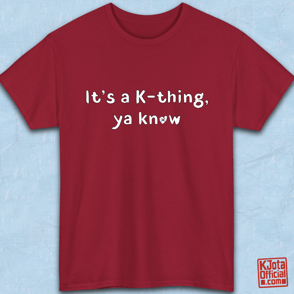 “It’s a K-thing, Ya Know” printed on red t-shirt flatlay by K-Jota