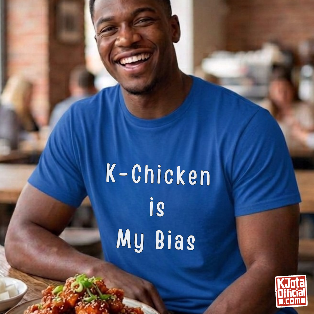 Man wearing “K-Chicken Is My Bias” Korean fried chicken fan slogan printed on front of blue t-shirt by K-Jota