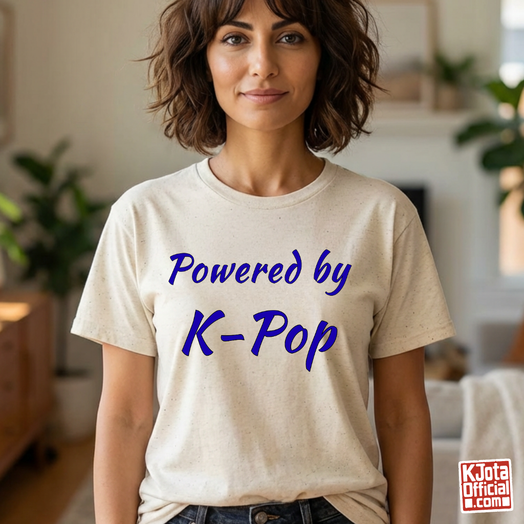 Woman wearing “Powered by K-Pop” beige t-shirt made for stans by K-Jota
