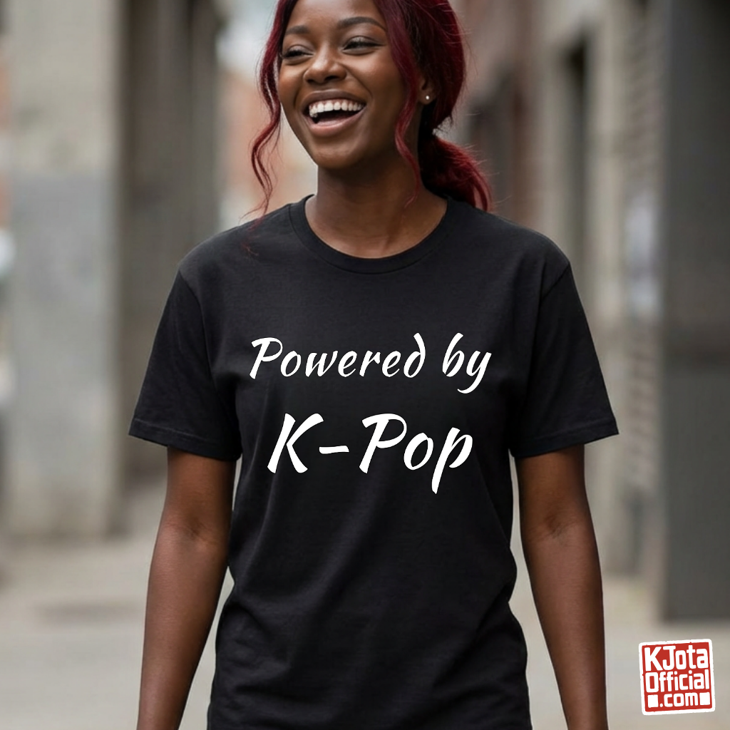 Woman wearing “Powered by K-Pop” black t-shirt made for stans by K-Jota