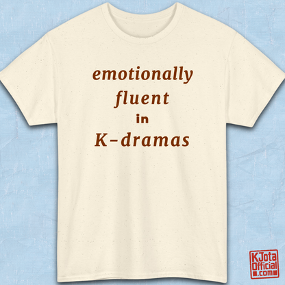 “emotionally fluent in K-dramas” printed on front of tee, Korean show superfan identity binge watching outfit beige t-shirt flatlay by K-Jota