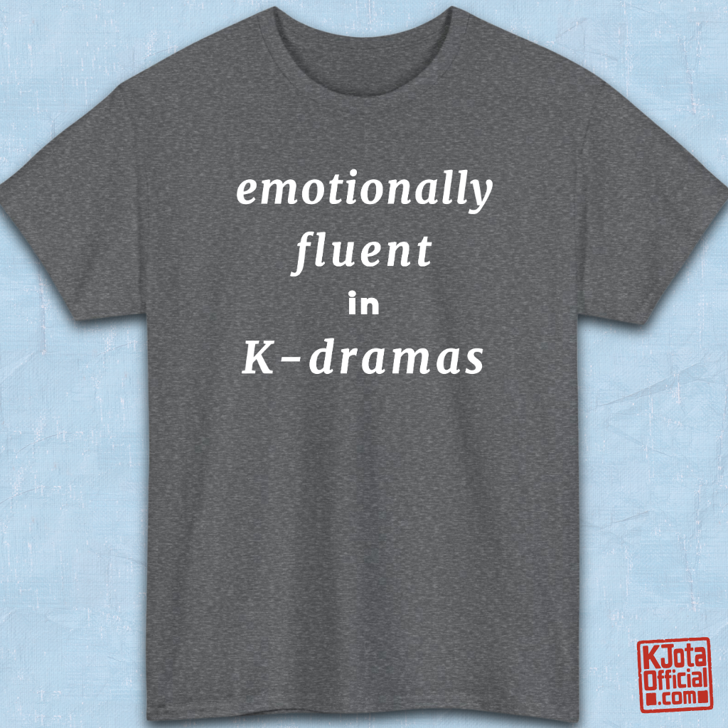 “emotionally fluent in K-dramas” printed on front of tee, Korean show superfan identity binge watching outfit gray t-shirt flatlay by K-Jota