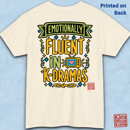 “Emotionally Fluent in K-Dramas” printed on front of tee, Korean show superfan identity binge watching t-shirt beige backside flatlay by K-Jota
