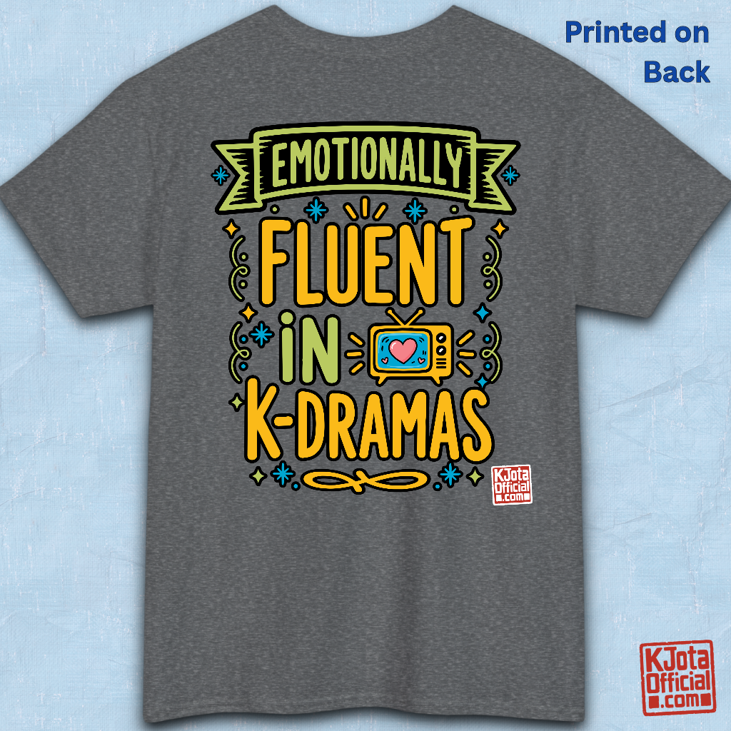 “Emotionally Fluent in K-Dramas” printed on front of tee, Korean show superfan identity binge watching t-shirt gray backside flatlay by K-Jota