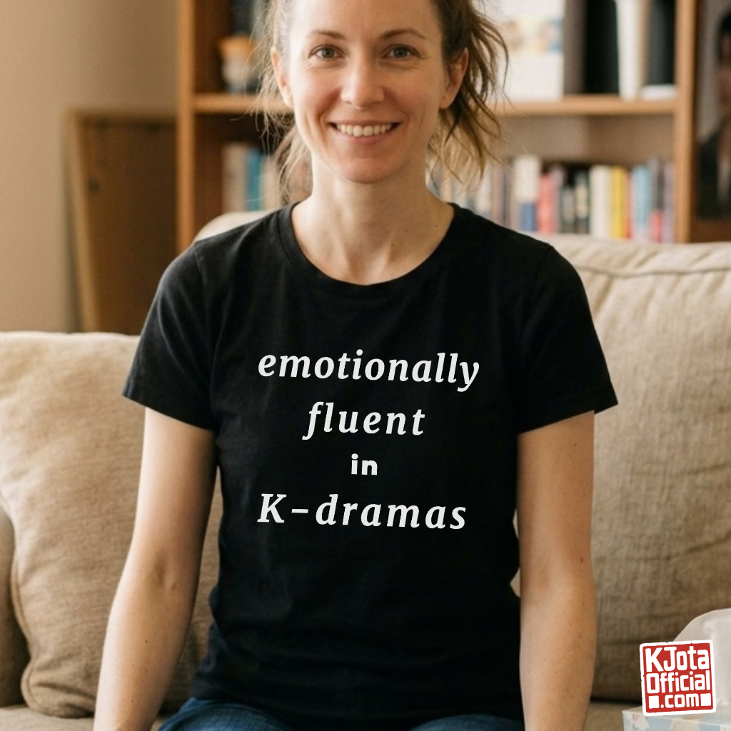 female fan wearing “emotionally fluent in K-dramas” printed on front of tee, Korean show superfan identity binge watching outfit black t-shirt by K-Jota
