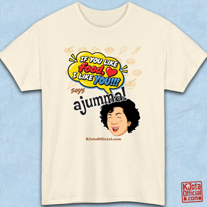 beige t-shirt flatlay with a comic-style yellow speech bubble reading 'If You Like Food, I Like You!!!' above a laughing Korean ajumma illustration and hand-drawn Korean food icons by K-Jota