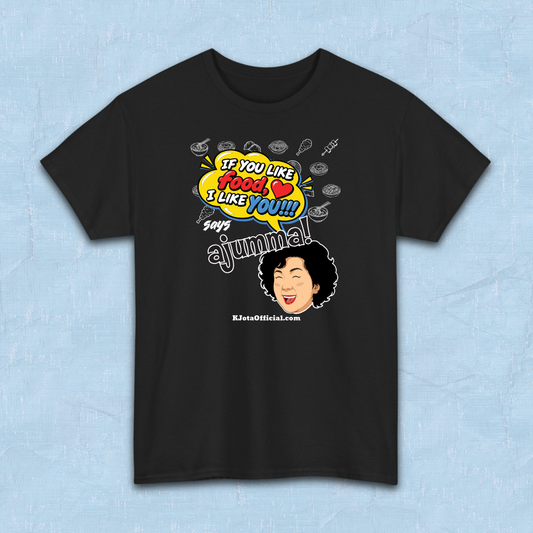 black t-shirt flatlay with a comic-style yellow speech bubble reading 'If You Like Food, I Like You!!!' above a laughing Korean ajumma illustration and hand-drawn Korean food icons by K-Jota
