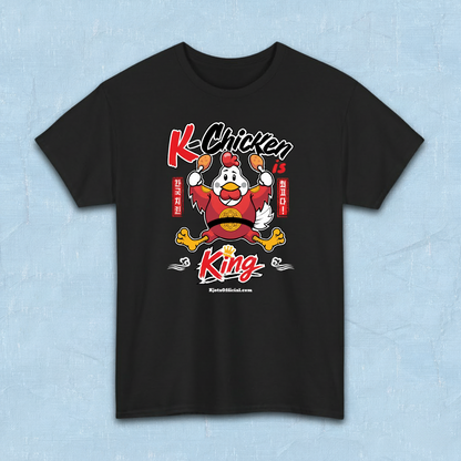 K-Chicken is King graphic t-shirt in black featuring a Korean fried chicken mascot wearing red royal robes holding fried chicken drumsticks with Hangeul text by Kjota