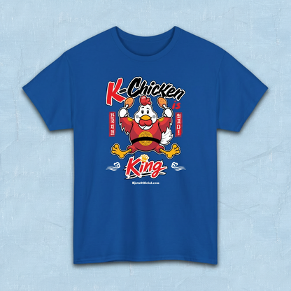 K-Chicken is King graphic t-shirt in blue featuring a Korean fried chicken mascot wearing red royal robes holding fried chicken drumsticks with Hangeul text by Kjota