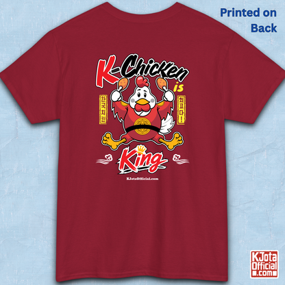 K-Chicken is King graphic t-shirt in red featuring a Korean chicken mascot wearing a red royal robe and holding fried chicken drumsticks with Hangeul text by K-Jota.  Backside flatlay.
