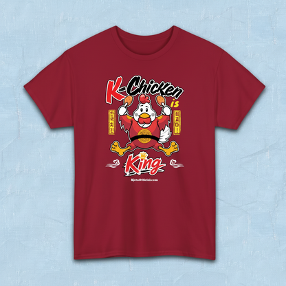 K-Chicken is King graphic t-shirt in red featuring a Korean fried chicken mascot wearing red royal robes holding fried chicken drumsticks with Hangeul text by Kjota