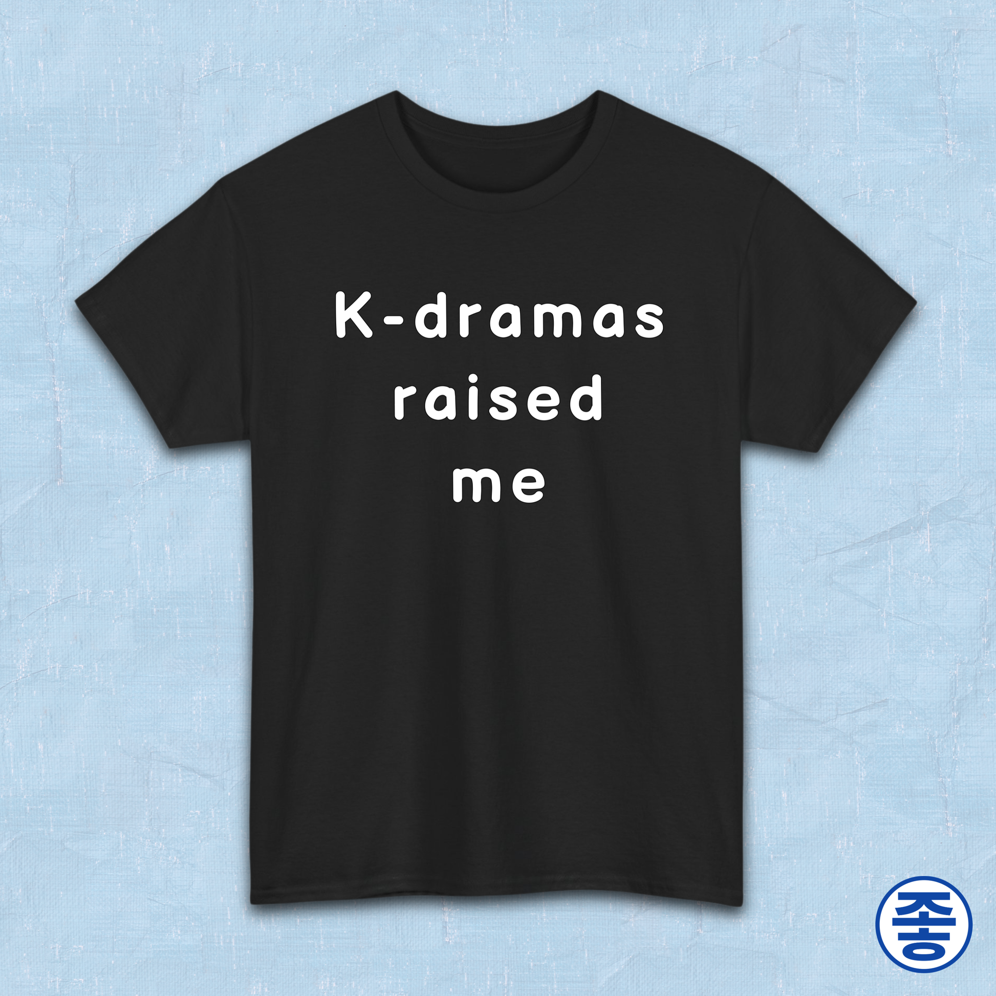 Black t-shirt for Korean show fans with 'K-dramas raised me' text on a light blue background by Kjota