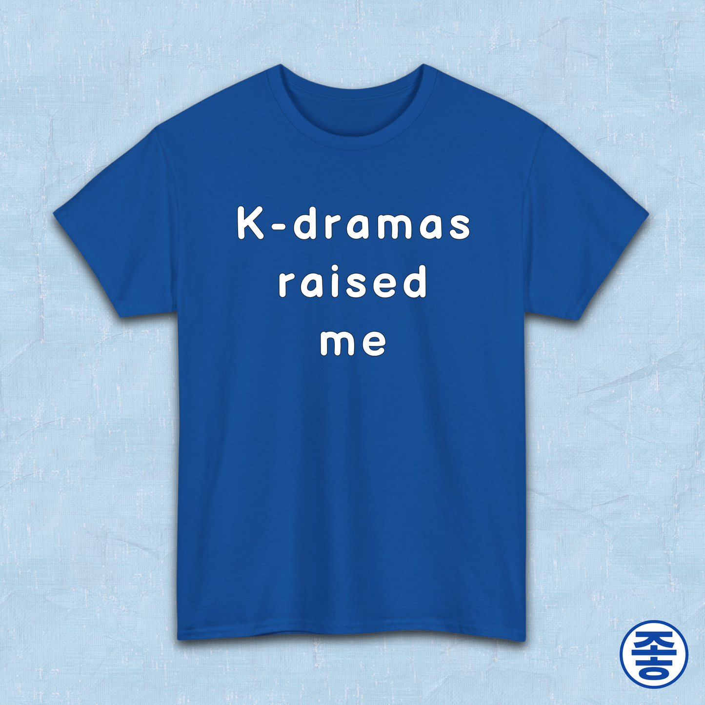 Blue t-shirt for Korean show fans with 'K-dramas raised me' text on a light blue background by Kjota