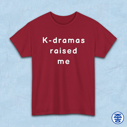 Red t-shirt for Korean show fans with 'K-dramas raised me' text on a light blue background by Kjota