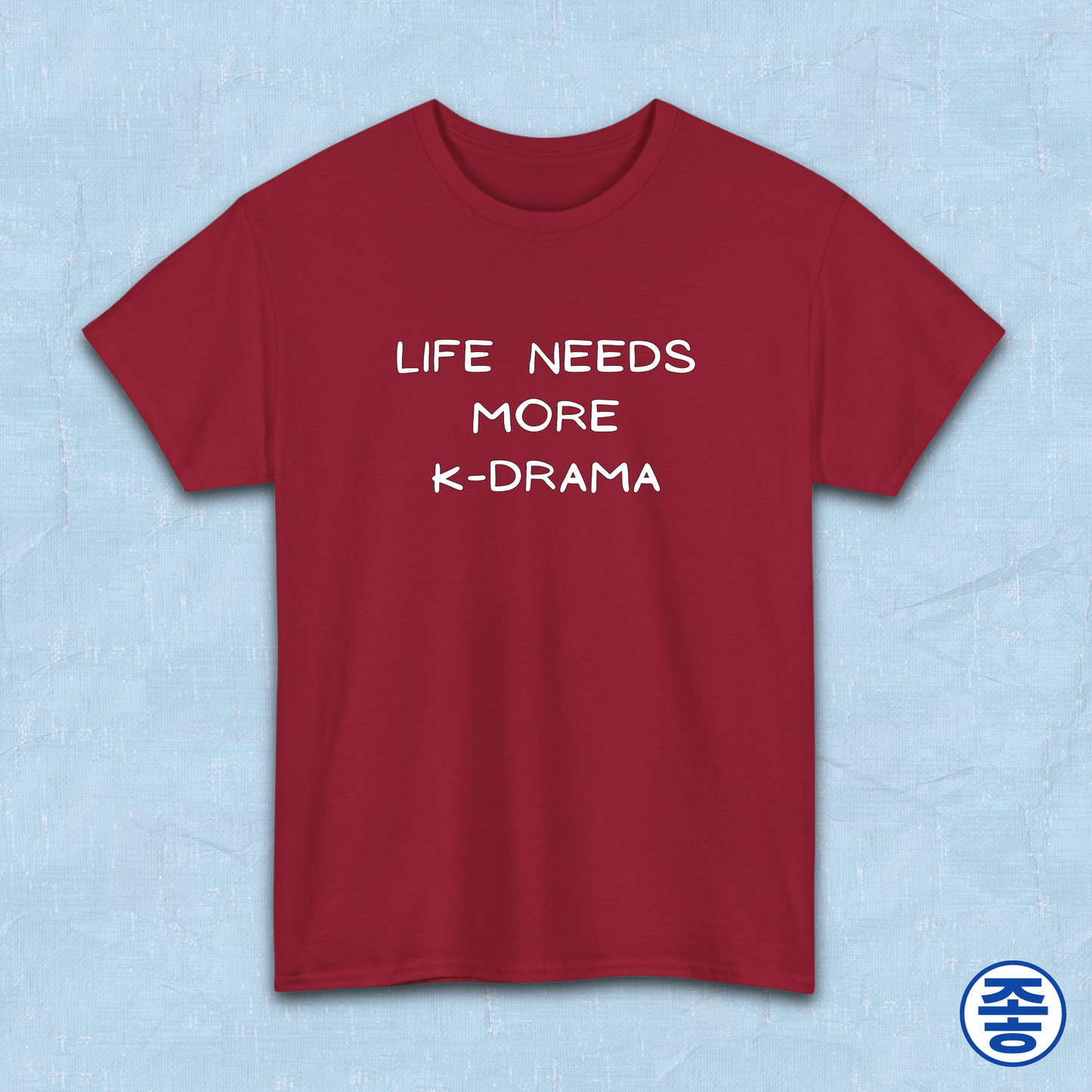 Red t-shirt for Korean show fans with 'LIFE NEEDS MORE K-DRAMA' text on a light blue background by Kjota