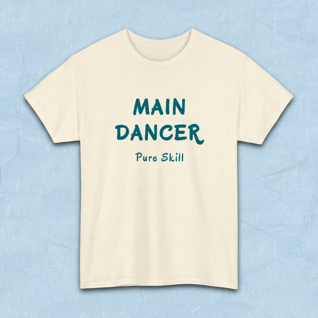 K-pop group member role fan beige t-shirt with “Main dancer Pure Skill” printed on front. Flatlay by Kjota