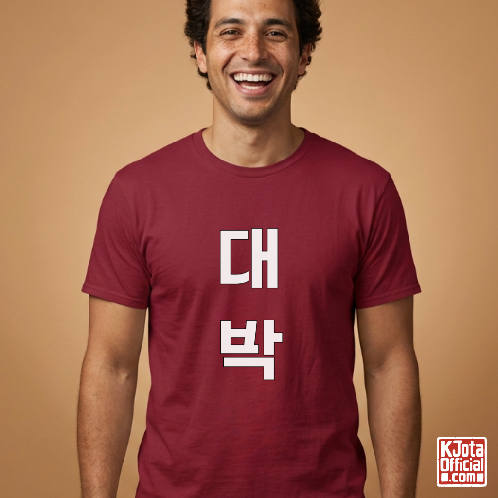 man wearing a red t-shirt with “대박” Daebak Korean text printed on front by K-Jota