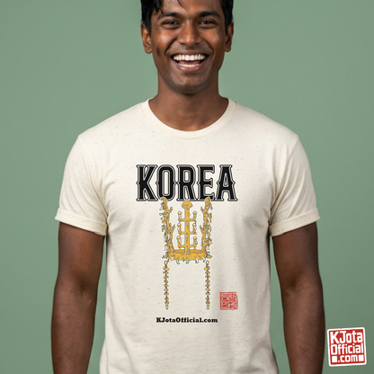 man wearing a beige t-shirt by K-Jota with image of gold crown from Korea’s Silla dynasty printed on the front