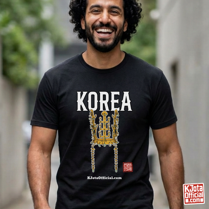 man wearing a black t-shirt by K-Jota with image of gold crown from Korea’s Silla dynasty printed on the front