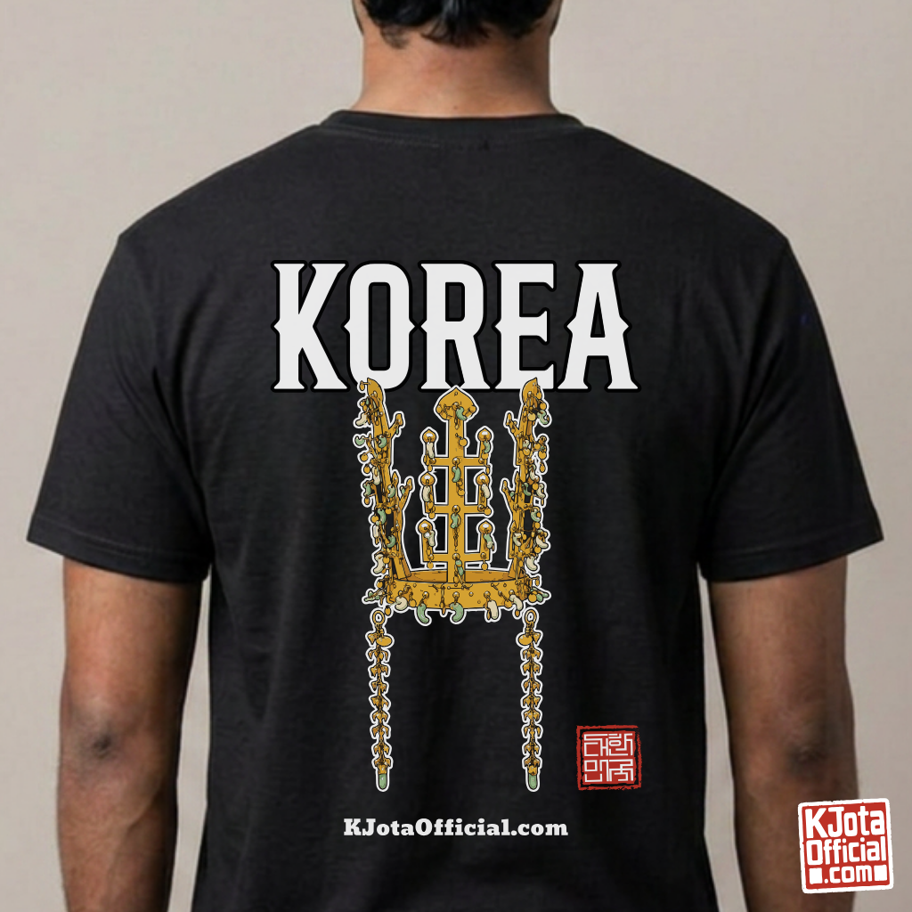 man wearing a black t-shirt by K-Jota with image of gold crown from Korea’s Silla dynasty printed on the back