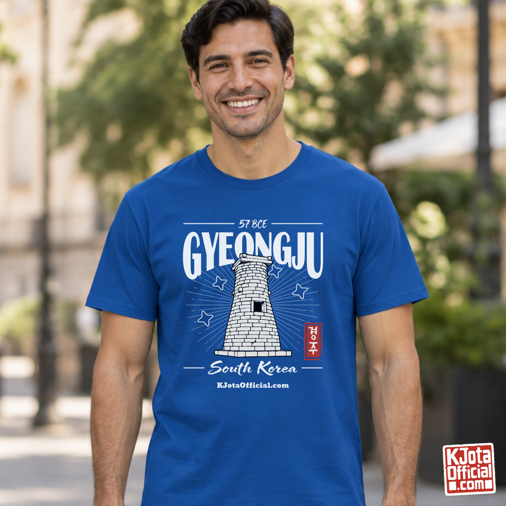 man wearing a Gyeongju 57 BCE Cheomseongdae observatory design on blue T-shirt by K-Jota