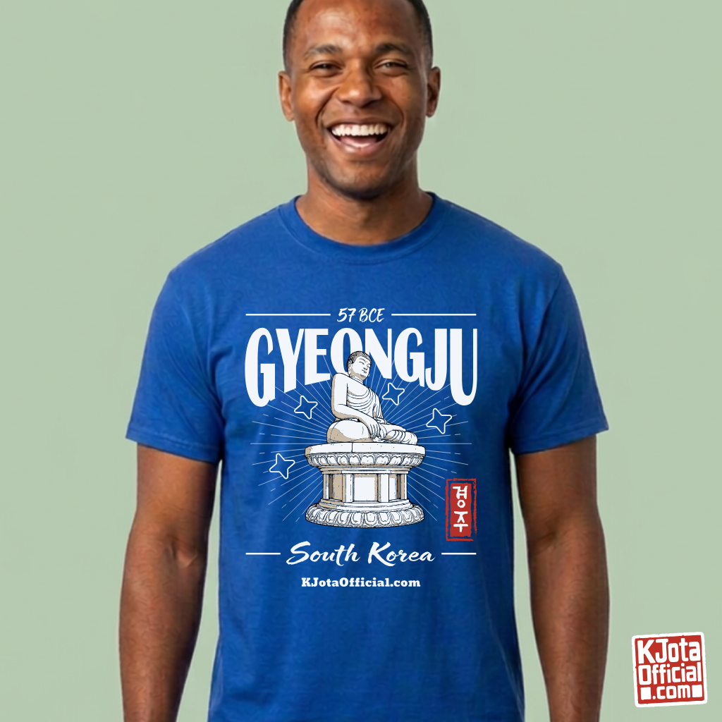 man wearing Gyeongju 57 BCE South Korea blue t-shirt featuring the historic Seokguram Buddha graphic by K-Jota