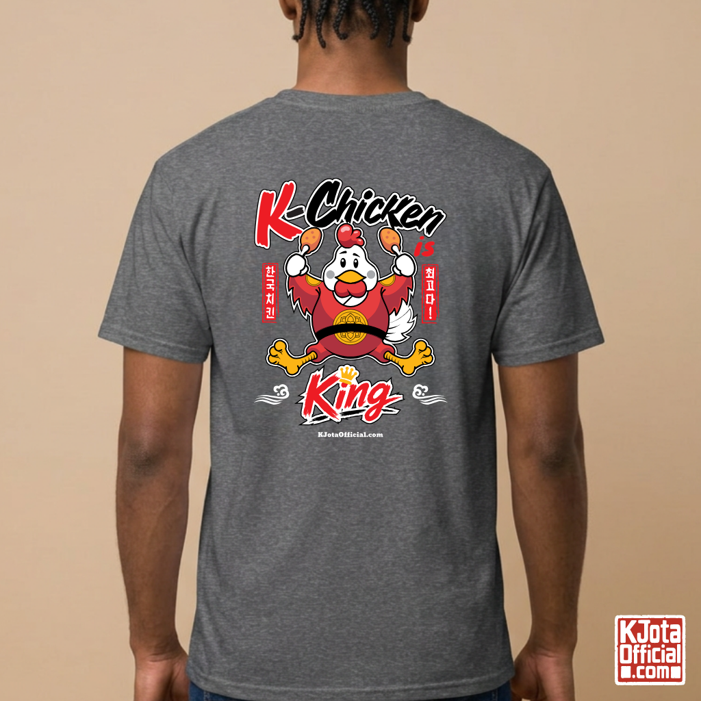 man wearing “K-Chicken is King” graphic gray t-shirt featuring a Korean chicken mascot wearing a red royal robe and holding fried chicken drumsticks with Hangeul text printed on back of tee by K-Jota