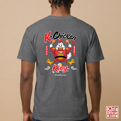 man wearing “K-Chicken is King” graphic gray t-shirt featuring a Korean chicken mascot wearing a red royal robe and holding fried chicken drumsticks with Hangeul text printed on back of tee by K-Jota