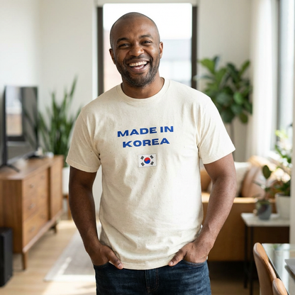 man wearing a beige t-shirt with “Made in Korea” text and South Korean flag, K-fandom apparel by Kjota
