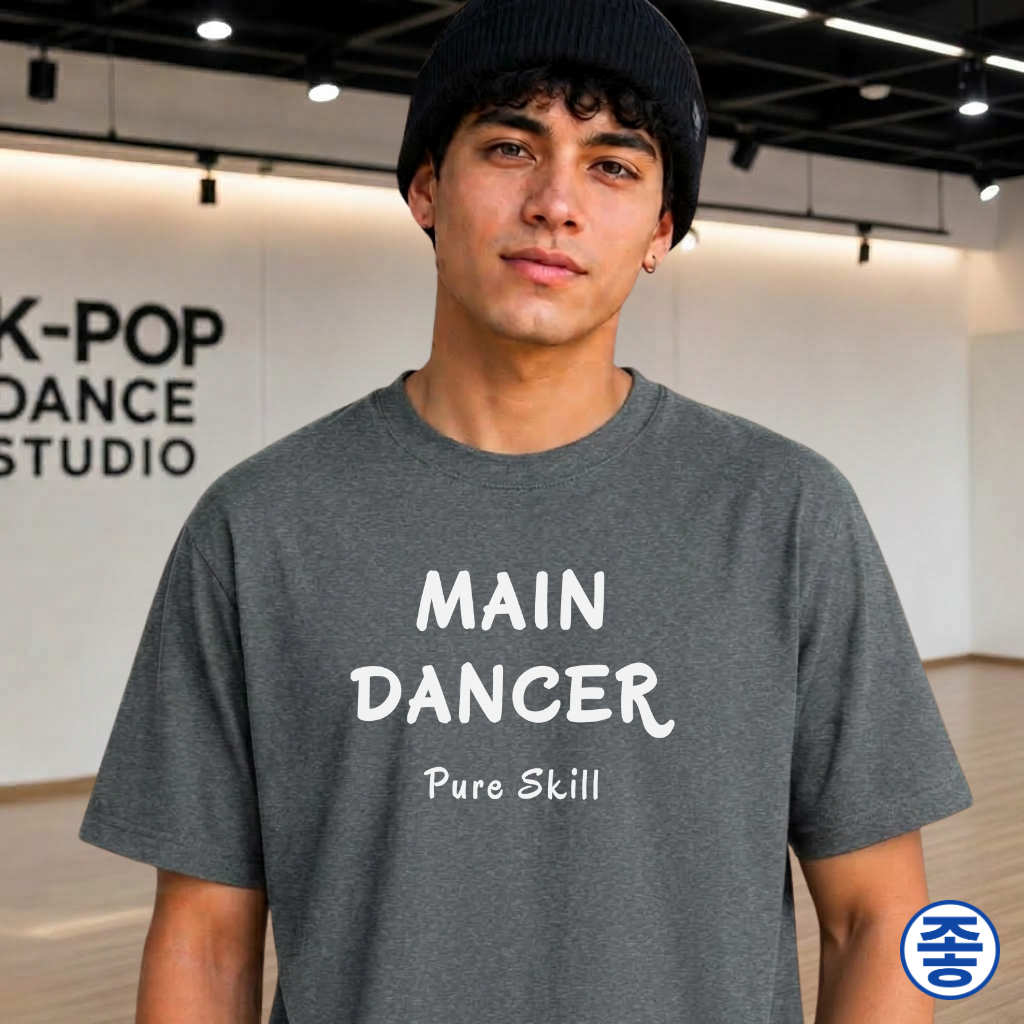 man wearing a K-pop group member role fan gray t-shirt with “Main dancer Pure Skill” printed on front. K-pop fan cotton tee by Kjota