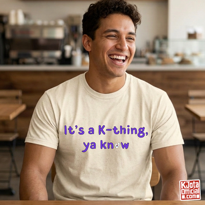 man wearing “It’s a K-thing, Ya Know” printed on beige t-shirt by K-Jota