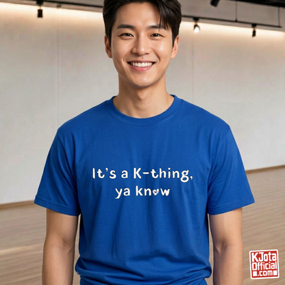 man wearing “It’s a K-thing, Ya Know” printed on blue t-shirt by K-Jota