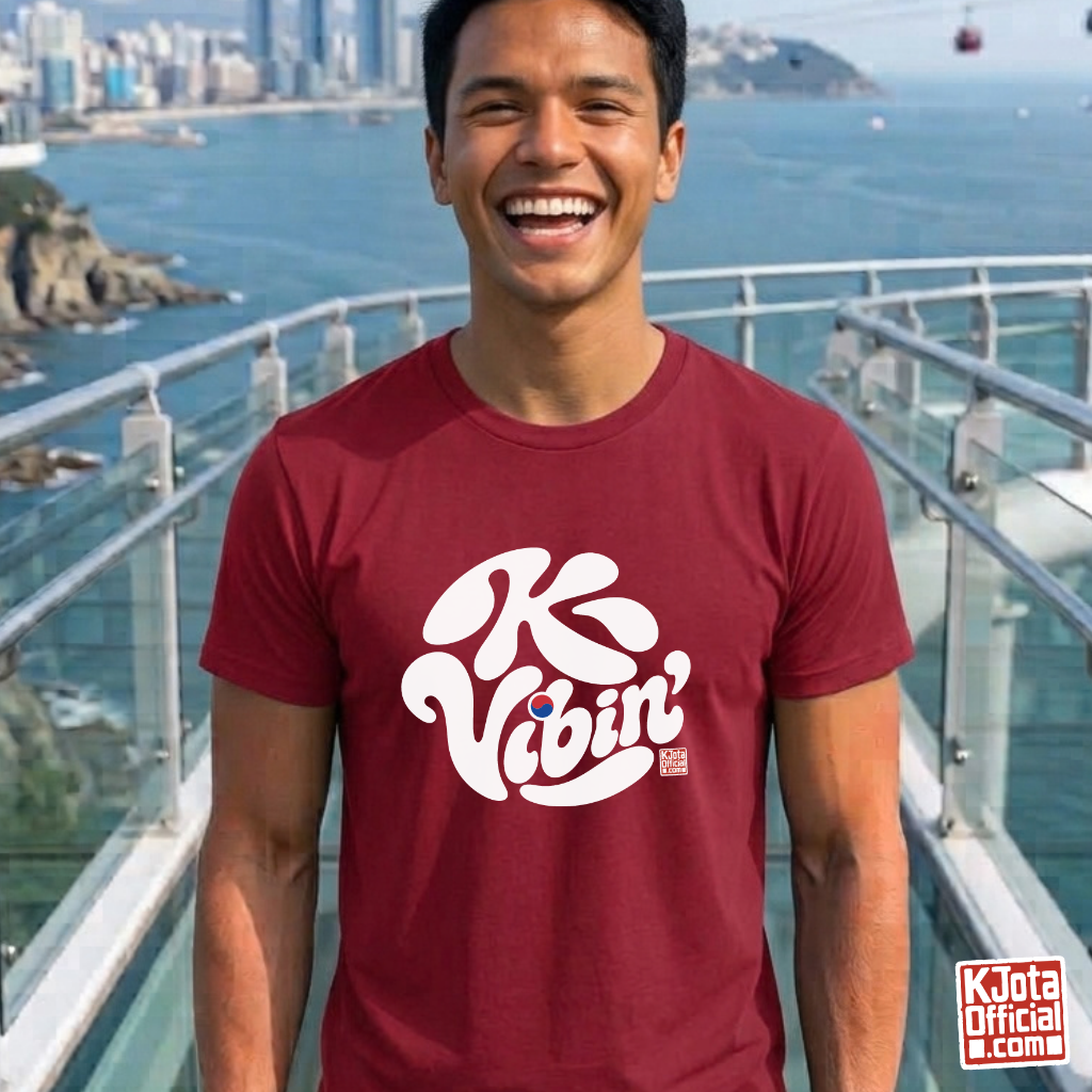 man wearing “K-Vibin’” printed on front of red t-shirt South Korea fandom merch by K-Jota