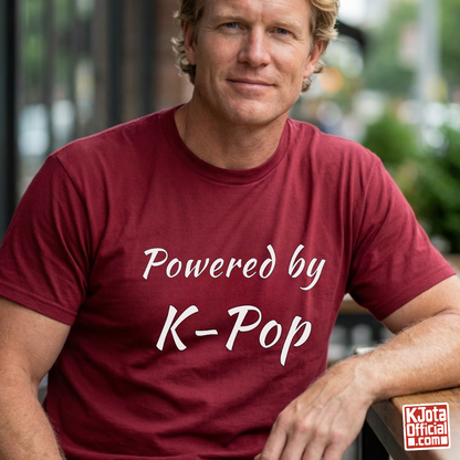 man wearing “Powered by K-Pop” red t-shirt made for stans by K-Jota