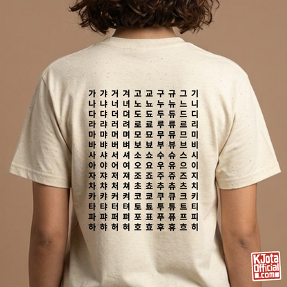 woman wearing Hangeul 한글 Alphabet Chart printed on back of beige t-shirt featuring Korean consonants and vowels by K-Jota