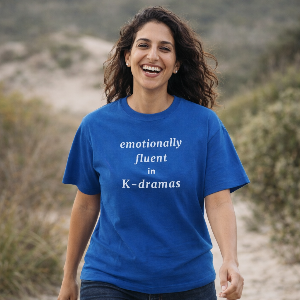 woman wearing emotionally fluent in k-dramas fan t-shirt blue by Kjota