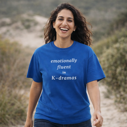 woman wearing emotionally fluent in k-dramas fan t-shirt blue by Kjota