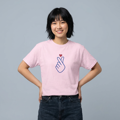 woman wearing finger heart Korean saranghaeyo K-pop fan t-shirt pink by Kjota