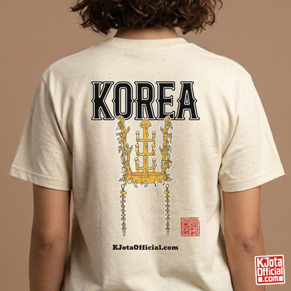woman wearing a beige t-shirt by K-Jota with image of gold crown from Korea’s Silla dynasty printed on the back