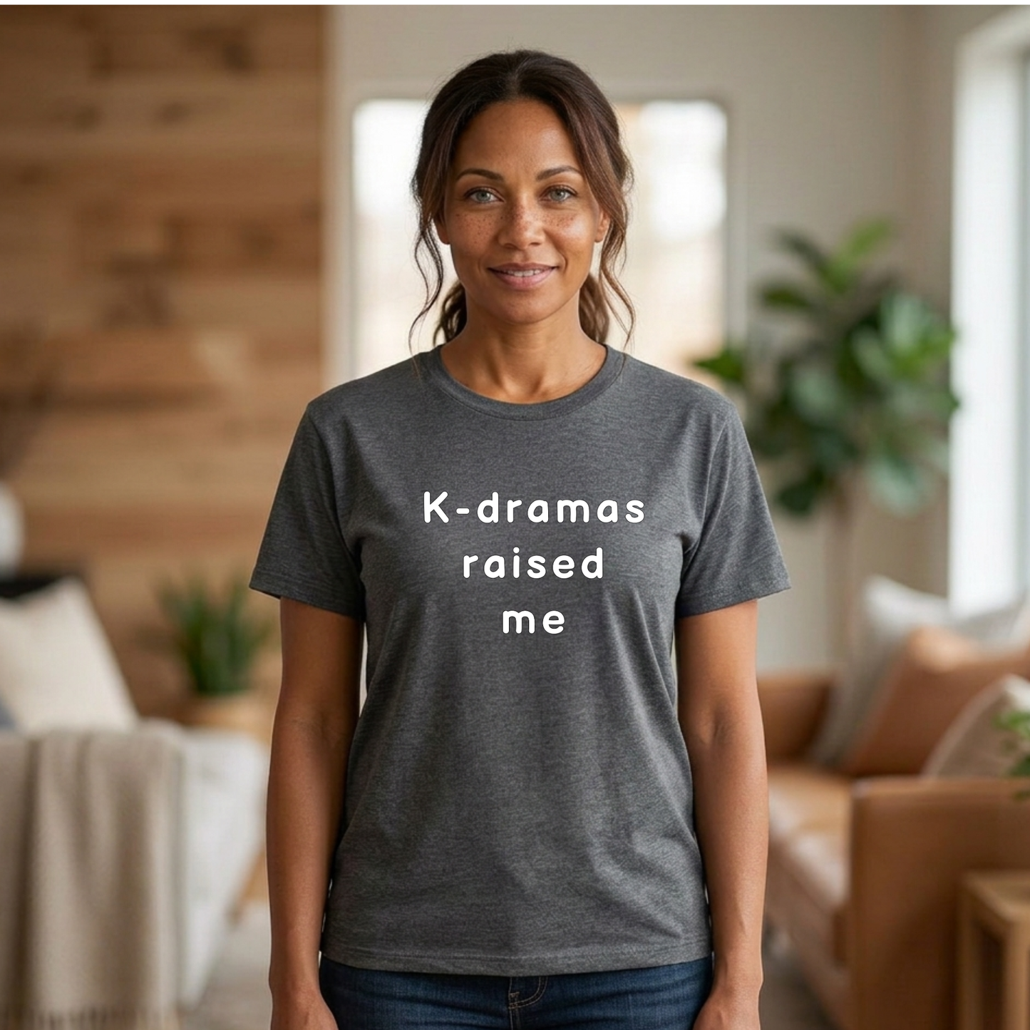 woman wearing gray t-shirt for Korean show fans with 'K-dramas raised me' text by Kjota