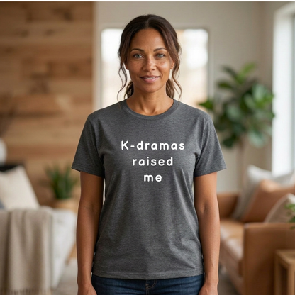 woman wearing gray t-shirt for Korean show fans with 'K-dramas raised me' text by Kjota
