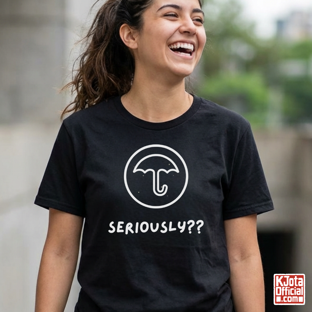 woman wearing a black t-shirt with Dalgona candy umbrella design inspired by Squid Game Korean street snack honeycomb candy. K-fandom merch by K-Jota