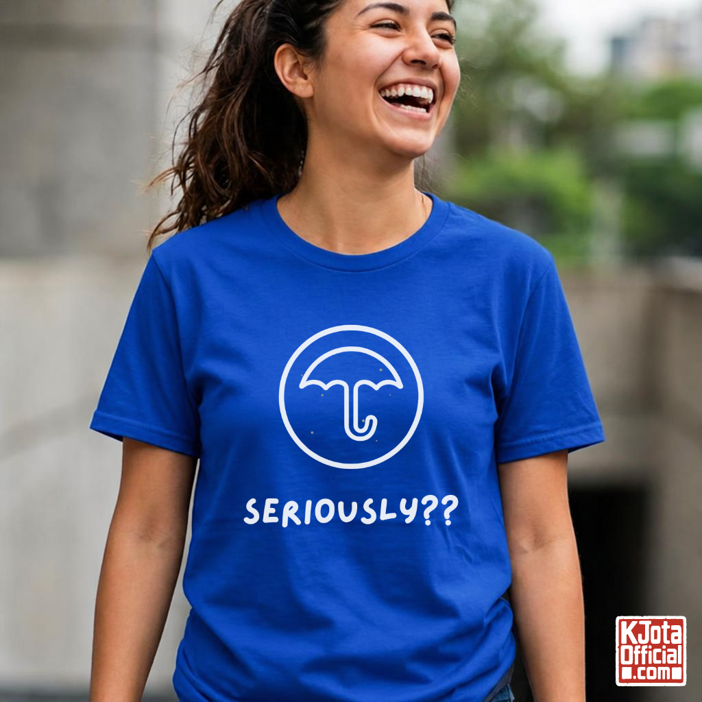 woman wearing a blue t-shirt with Dalgona candy umbrella design inspired by Squid Game Korean street snack honeycomb candy. K-fandom merch by K-Jota