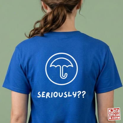 woman wearing a blue t-shirt with Dalgona candy umbrella design printed on back. Inspired by Squid Game Korean street snack honeycomb candy. K-fandom merch by K-Jota