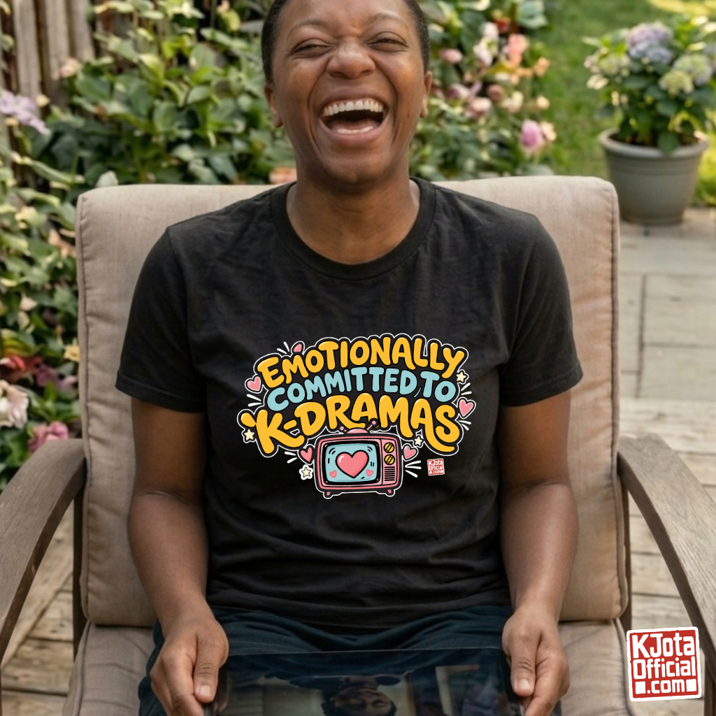 woman wearing “Emotionally Committed to K-dramas” printed on front of black t-shirt, Korean show binge watching outfit by K-Jota